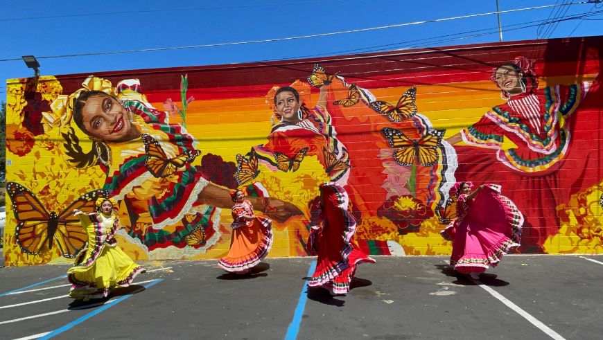 Northgate Blvd. mural with dancers in front