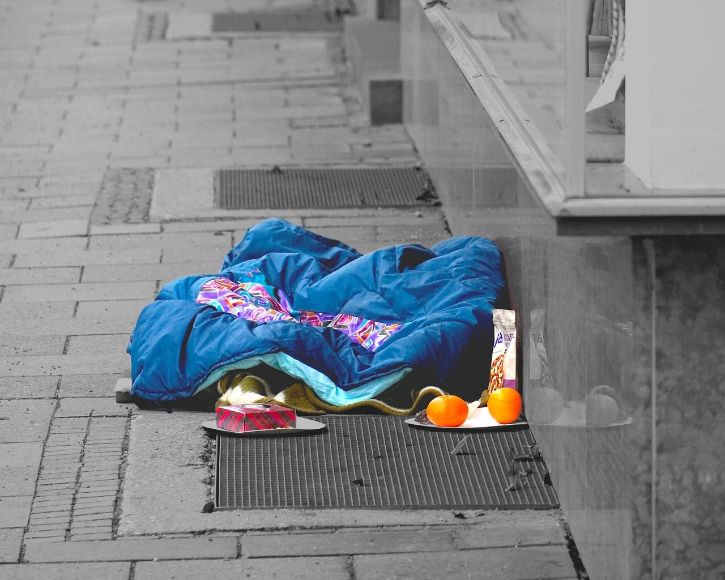 Sleeping bag on sidewalk