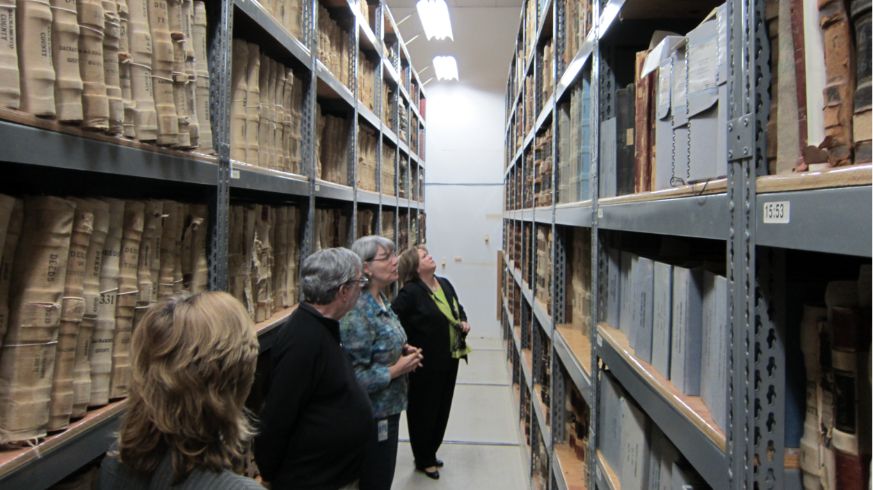 People looking at historical artifacts