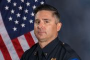 A portrait photo of the Sacramento Police Department Lieutenant Sean Cunningham, in full class-A uniform