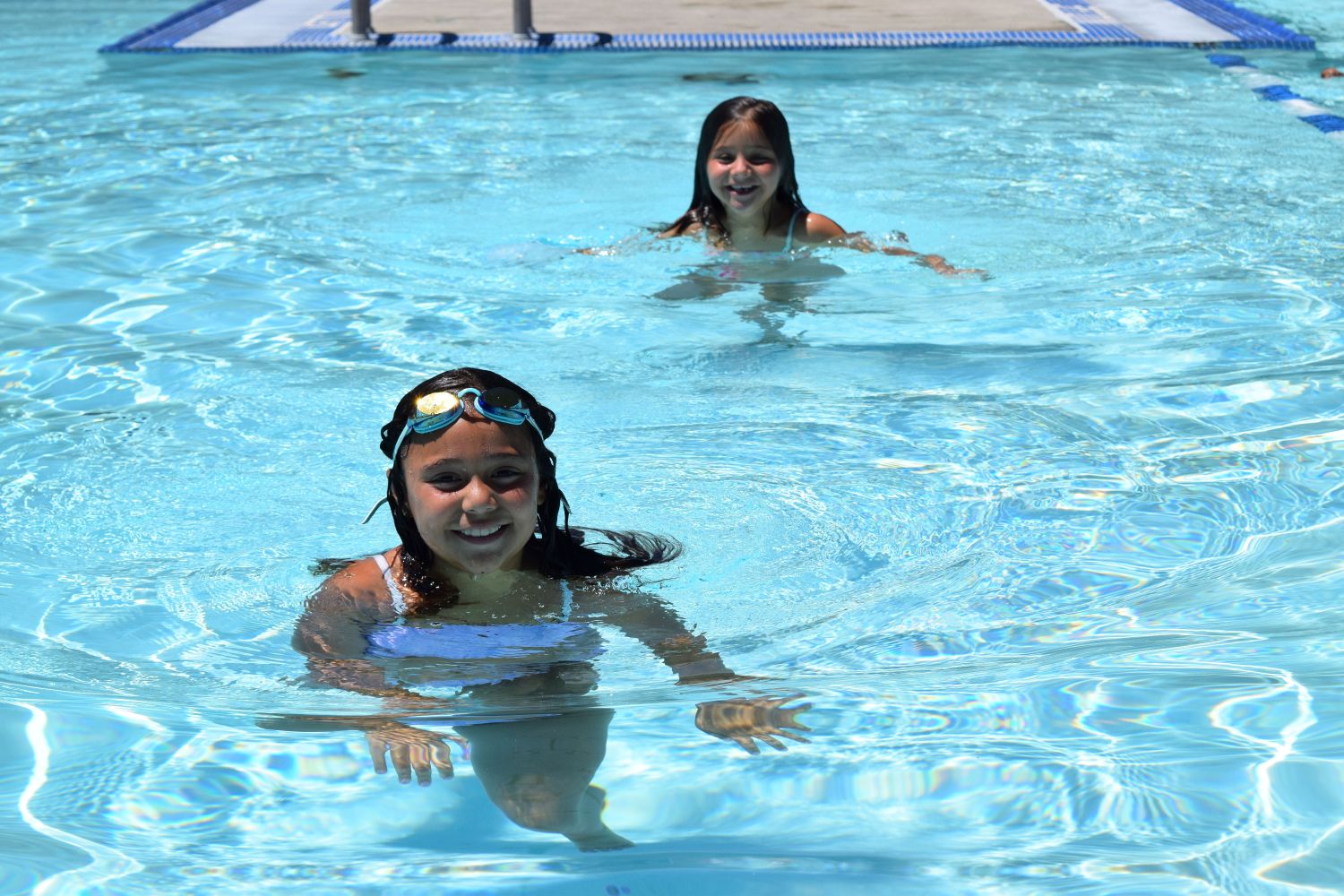 family in pool