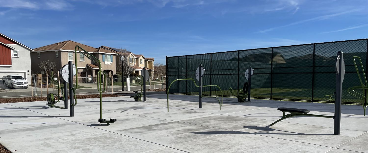 Image of a group fitness area at a park.